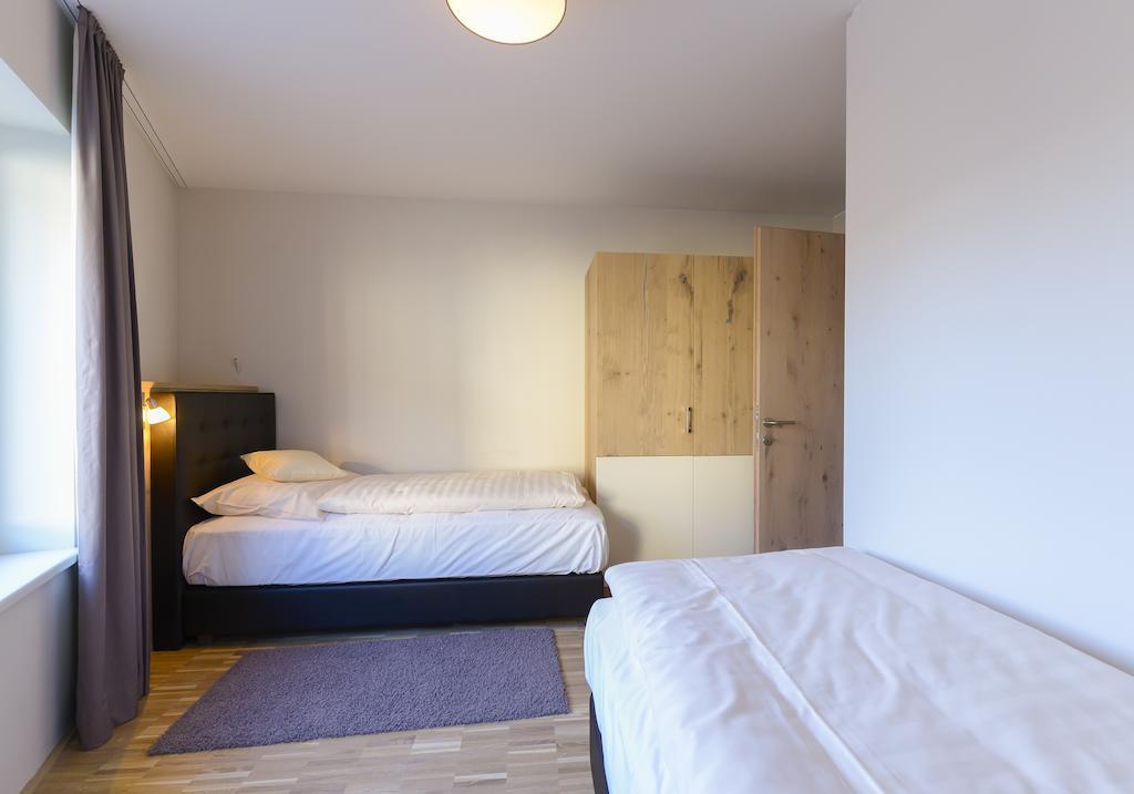 Appartementhotel Sonnenhof Kössen Habitación foto