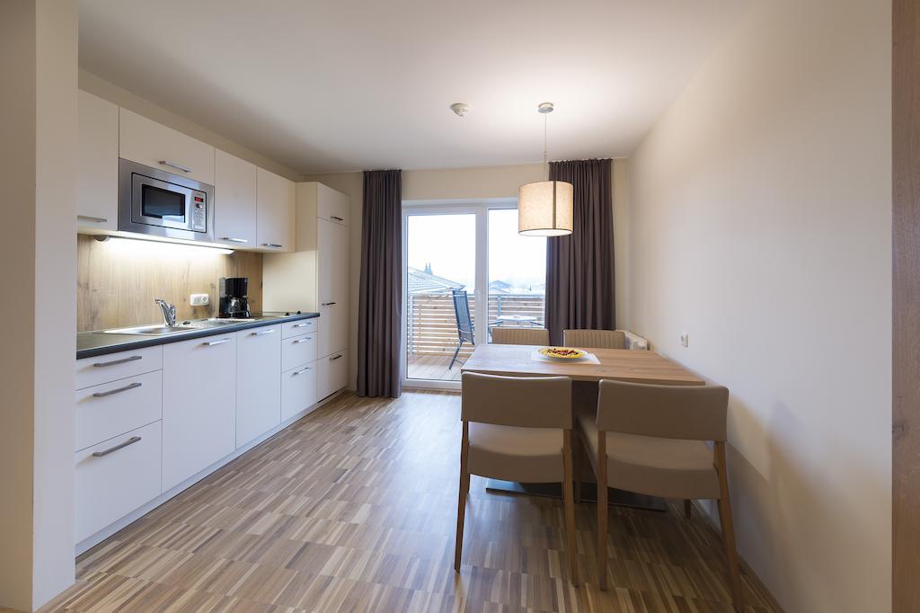 Appartementhotel Sonnenhof Kössen Habitación foto
