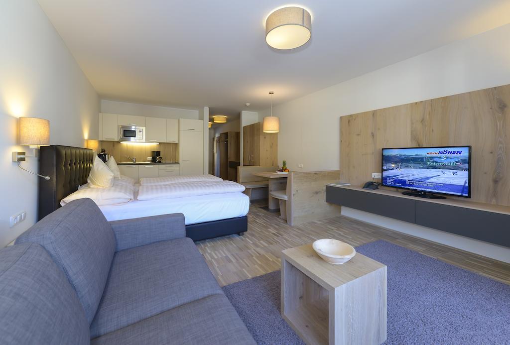 Appartementhotel Sonnenhof Kössen Habitación foto