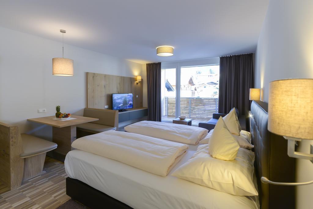 Appartementhotel Sonnenhof Kössen Habitación foto