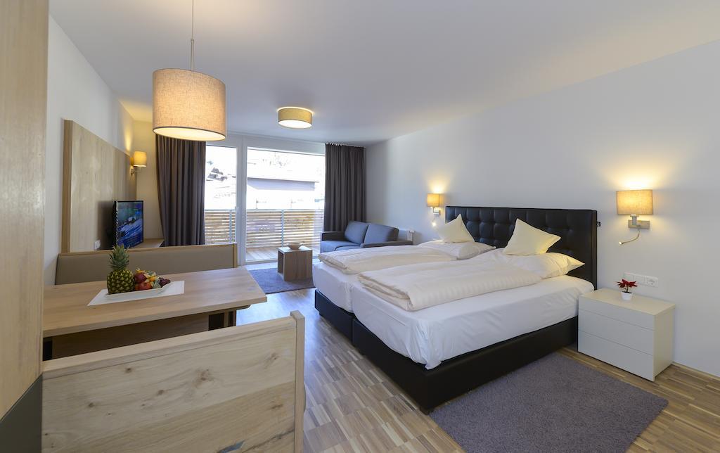 Appartementhotel Sonnenhof Kössen Habitación foto